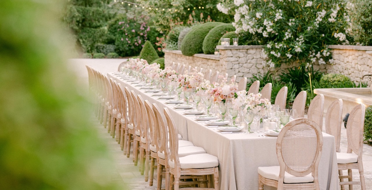 Table decorated with florals for a wedding reception.