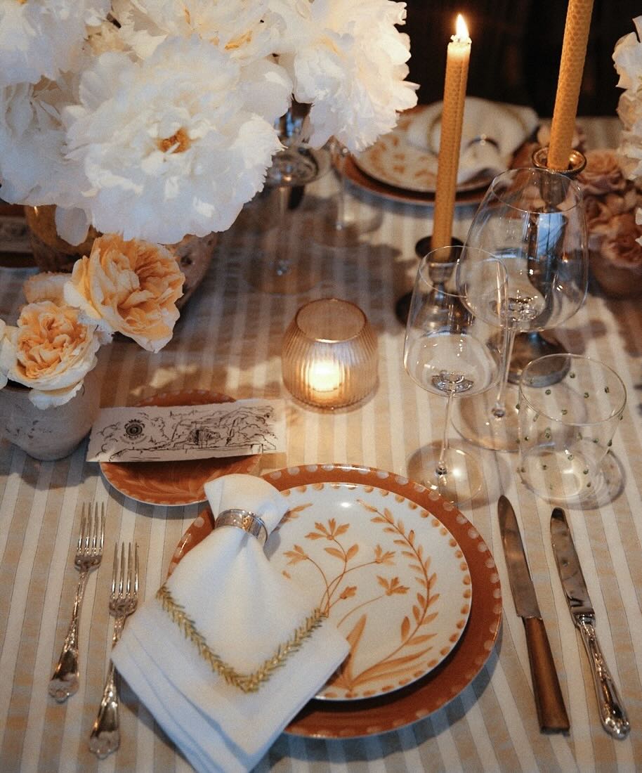 Table decorated with florals for a wedding reception.